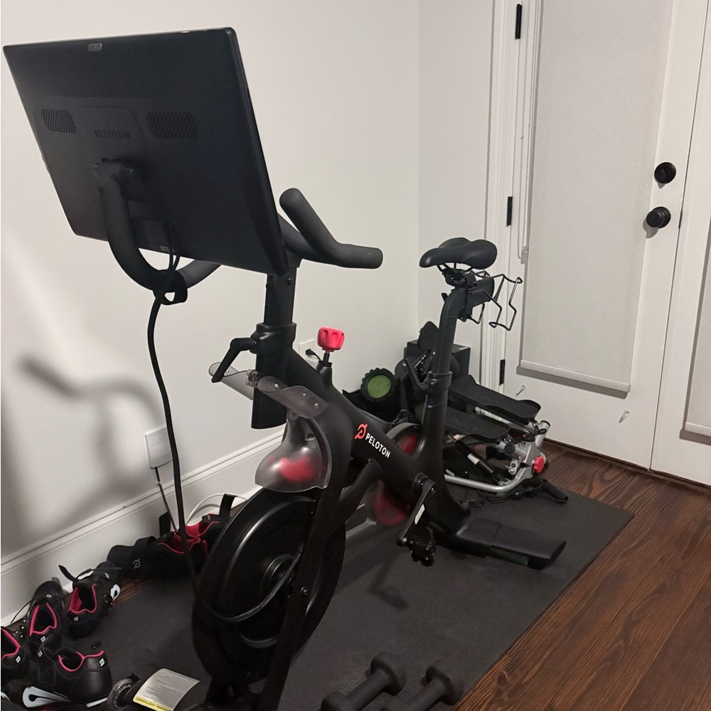 Peloton Black and Red Exercise Bike with Screen